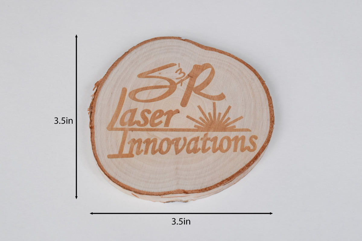a round birch coaster on a white background with size markers