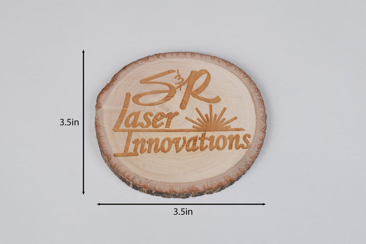 a round basswood coaster on a white background with size markers