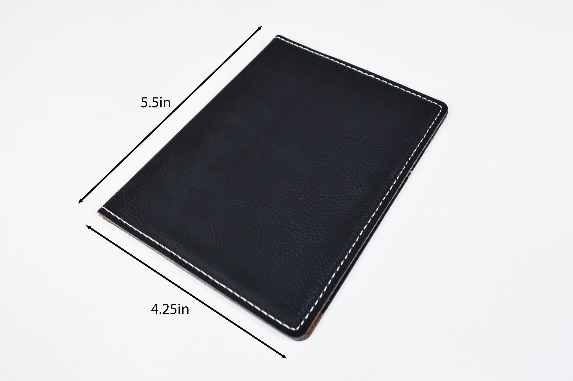 a black synthetic leatherette passport holder on a white background with size indicators