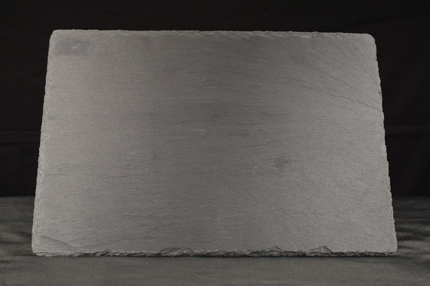 Rectangular slate stone on a black background